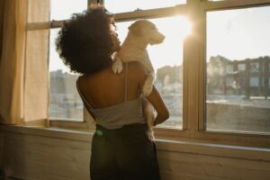 Image of a woman embracing change to represent new beginnings. Image courtesy Pexels.com